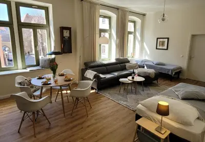 Ein Sitzbereich in der Unterkunft Cosel Apartment Altstadt Radfahrer Balkon WLAN