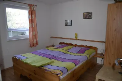 Ein Bett oder Betten in einem Zimmer der Unterkunft Haus Panoramablick