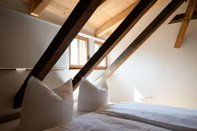 Ein Bett oder Betten in einem Zimmer der Unterkunft Zimmer An der Wasserburg