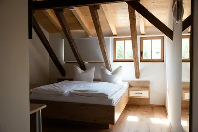 Ein Bett oder Betten in einem Zimmer der Unterkunft Zimmer An der Wasserburg