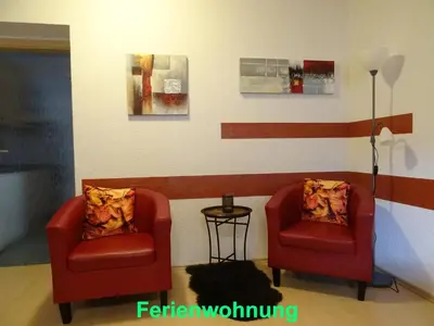 Ein Sitzbereich in der Unterkunft Ferienwohnung Sobrigau