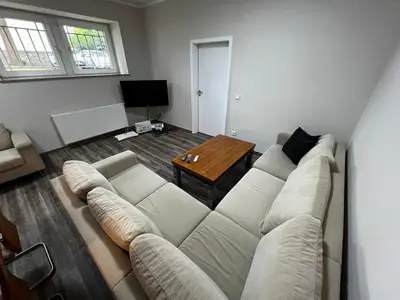 Ein Sitzbereich in der Unterkunft Apartment an der Jungen Garde
