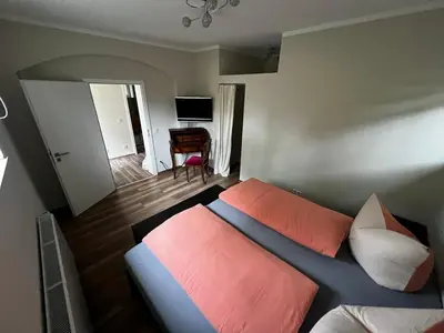 Ein Bett oder Betten in einem Zimmer der Unterkunft Apartment an der Jungen Garde