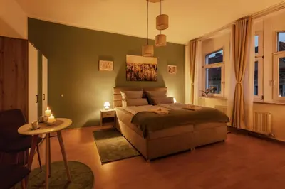 Ein Bett oder Betten in einem Zimmer der Unterkunft Neu Meißen Altstadt FamilyOase WLAN Netflix Magenta Disney