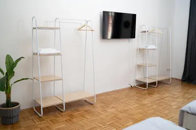 TV/Unterhaltungsangebot in der Unterkunft Design FerienOase mit Einzelbetten - 2 Schlafzimmer - Waschmaschine - Parkplatz