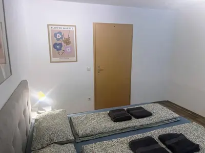 Ein Bett oder Betten in einem Zimmer der Unterkunft Famielienapartment An der Forellenschänke