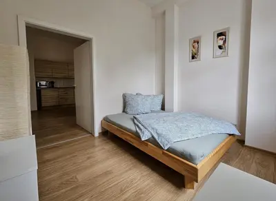 Ein Bett oder Betten in einem Zimmer der Unterkunft African Style in Kleinwelka