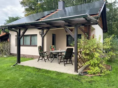 Ein Garten an der Unterkunft FH Waldidylle Nähe Torgau, Seebad Neumühle