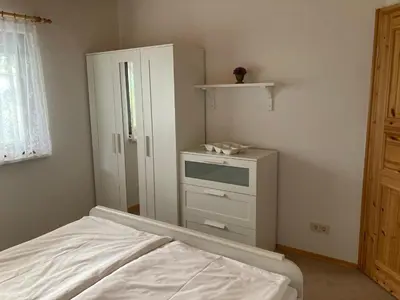 Ein Bett oder Betten in einem Zimmer der Unterkunft FH Waldidylle Nähe Torgau, Seebad Neumühle