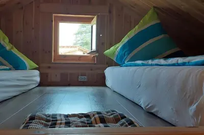 Ein Bett oder Betten in einem Zimmer der Unterkunft Ferienwohnung Erlebnisfarm John
