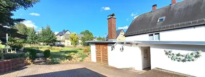 Ein Garten an der Unterkunft Am Forellenteich