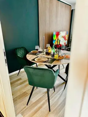Ein Sitzbereich in der Unterkunft KMHosting Zentrum Luxe Apartment Balkon