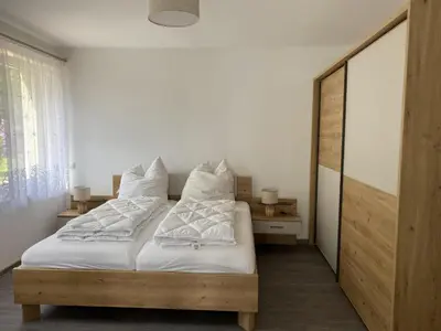 Ein Bett oder Betten in einem Zimmer der Unterkunft Ferienhaus Barbarine