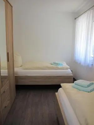 Ein Bett oder Betten in einem Zimmer der Unterkunft Ferienhaus Barbarine