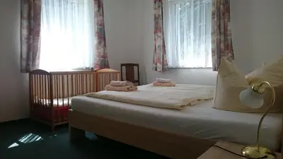 Ein Bett oder Betten in einem Zimmer der Unterkunft Ferienhaus Kaiserkrone