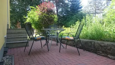 Ein Garten an der Unterkunft Ferienhaus Schrammsteinblick