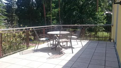 Ein Balkon oder eine Terrasse in der Unterkunft Ferienhaus Schrammsteinblick