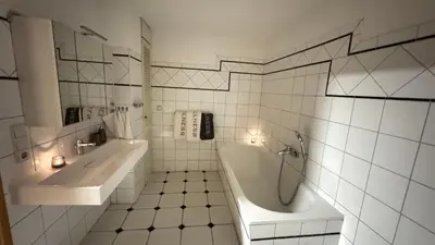 Ein Badezimmer in der Unterkunft Pension Arthur