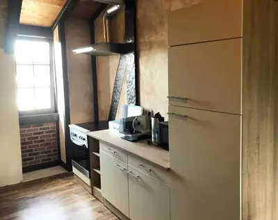 Küche/Küchenzeile in der Unterkunft Familienfreundliche Ferienwohnung GERICHTSSTUBE im Rittergut bei Dresden für 6 Pers