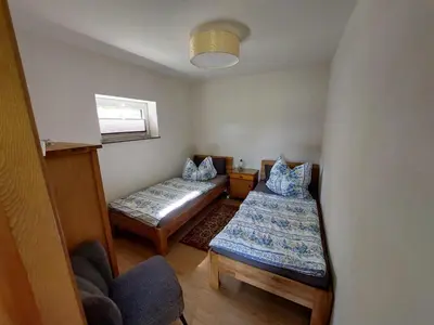 Ein Bett oder Betten in einem Zimmer der Unterkunft 