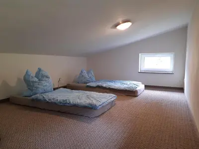 Ein Bett oder Betten in einem Zimmer der Unterkunft 