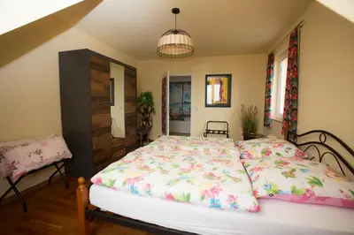 Ein Bett oder Betten in einem Zimmer der Unterkunft Sonne, Mond und Sterne