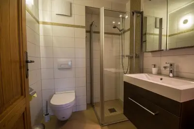 Ein Badezimmer in der Unterkunft Ferienwohnung in der Kraxlhütte Waltersdorf