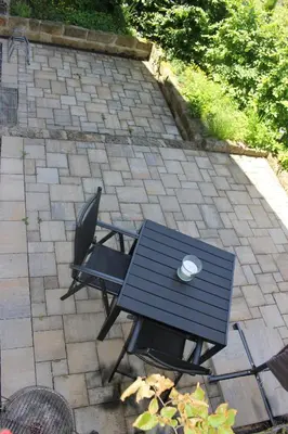 Ein Patio oder anderer Außenbereich in der Unterkunft Ferienwohnung in der Kraxlhütte Waltersdorf