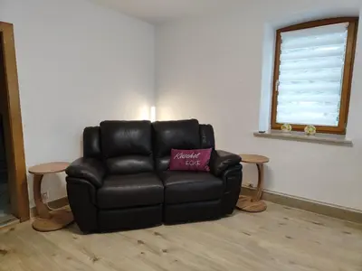 Ein Sitzbereich in der Unterkunft Ferienwohnung Kühnel