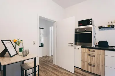 Küche/Küchenzeile in der Unterkunft Homely Apartments Großzügige 75qm Zentral & Gratis-Parkplatz