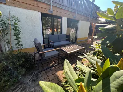 Ein Garten an der Unterkunft Ferienhaus am Bächelweg