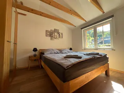 Ein Bett oder Betten in einem Zimmer der Unterkunft Ferienhaus am Bächelweg