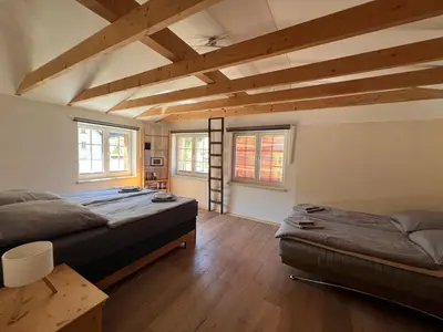 Ein Bett oder Betten in einem Zimmer der Unterkunft Ferienhaus am Bächelweg
