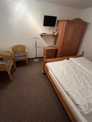 Ein Bett oder Betten in einem Zimmer der Unterkunft Ferienwohnung Zschopautal