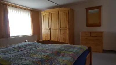 Ein Bett oder Betten in einem Zimmer der Unterkunft Haus Elbtalblick