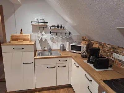 Küche/Küchenzeile in der Unterkunft Gemütliche Ferienwohnung bis 5 Personen nahe Seiffen mit Garten,Grill und Kachelofen