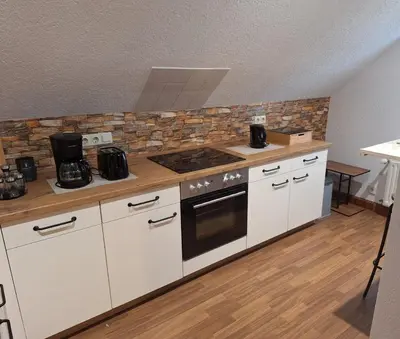 Küche/Küchenzeile in der Unterkunft Gemütliche Ferienwohnung bis 5 Personen nahe Seiffen mit Garten,Grill und Kachelofen
