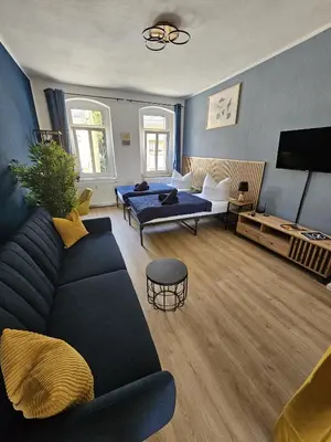 Ein Sitzbereich in der Unterkunft Moderne Ferienwohnung in unmittelbarer Nähe zum Schloss