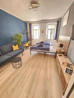 Ein Sitzbereich in der Unterkunft Moderne Ferienwohnung in unmittelbarer Nähe zum Schloss