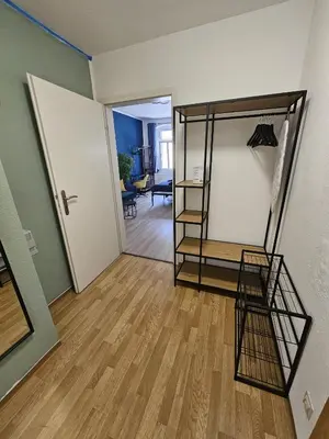 Ein Bett oder Betten in einem Zimmer der Unterkunft Moderne Ferienwohnung in unmittelbarer Nähe zum Schloss