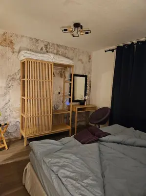 Ein Bett oder Betten in einem Zimmer der Unterkunft Ferienwohnung mit Weinbergblick