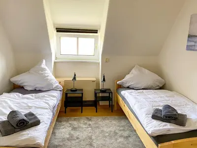 Ein Bett oder Betten in einem Zimmer der Unterkunft Monteurwohnungen Wiednitz, Einzelbetten, Küche, Parkplatz