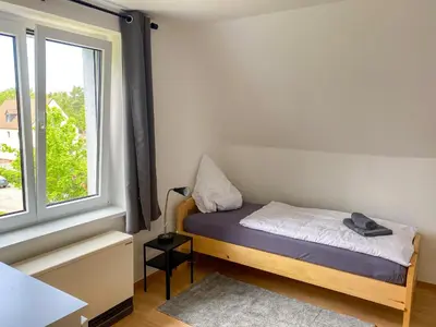 Ein Bett oder Betten in einem Zimmer der Unterkunft Monteurwohnungen Wiednitz, Einzelbetten, Küche, Parkplatz