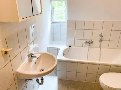 Ein Badezimmer in der Unterkunft Monteurwohnungen Wiednitz, Einzelbetten, Küche, Parkplatz