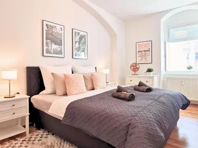 Ein Bett oder Betten in einem Zimmer der Unterkunft Fynbos Apartments in der historischen Altstadt, Loggia, Parkplatz