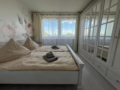 Ein Bett oder Betten in einem Zimmer der Unterkunft Sweet Home