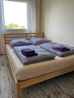 Ein Bett oder Betten in einem Zimmer der Unterkunft Sweet Home