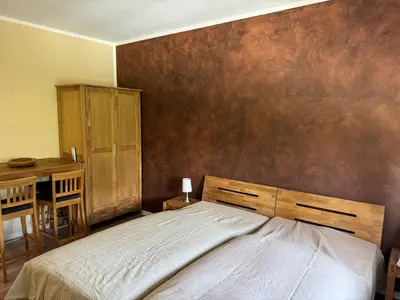 Ein Bett oder Betten in einem Zimmer der Unterkunft Ferienwohnung am Golfplatz