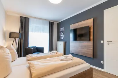 Ein Bett oder Betten in einem Zimmer der Unterkunft Moderne Appartement Wohnung mit 2 Schlafzimmern im Zentrum von Riesa