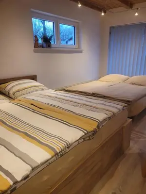Ein Bett oder Betten in einem Zimmer der Unterkunft Grubschützer Ferienhäuschen